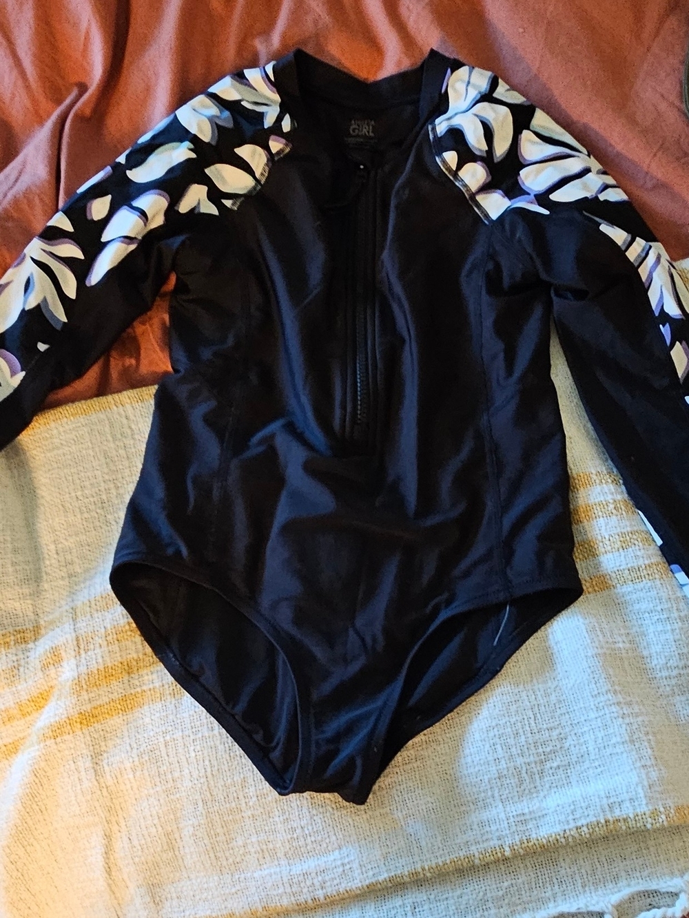 Athleta Girls Black Floral-Sleeve Kids One-Piece Swimsuit, Size 8/10